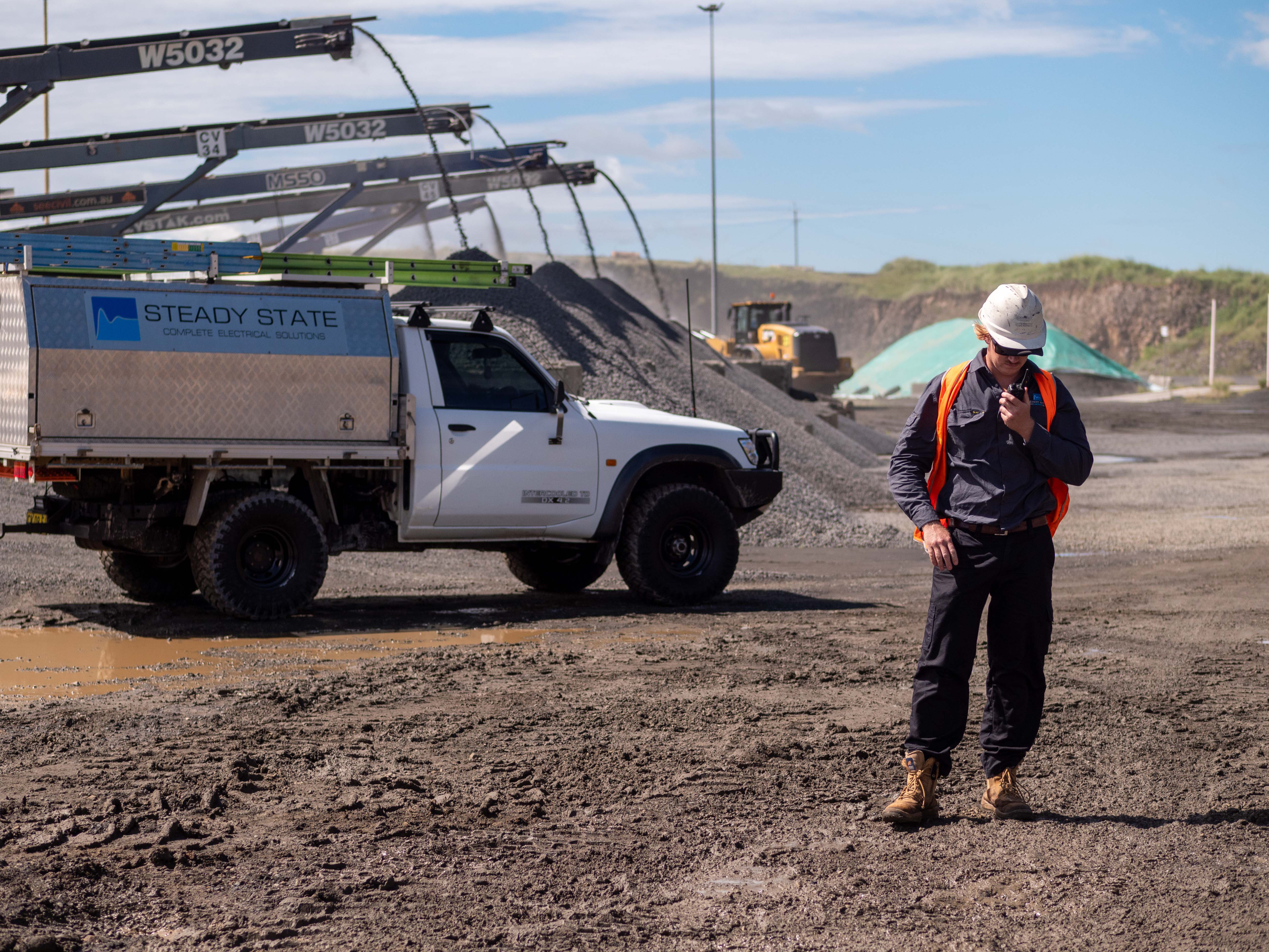 Steady State electrician on the radio at a working quarry